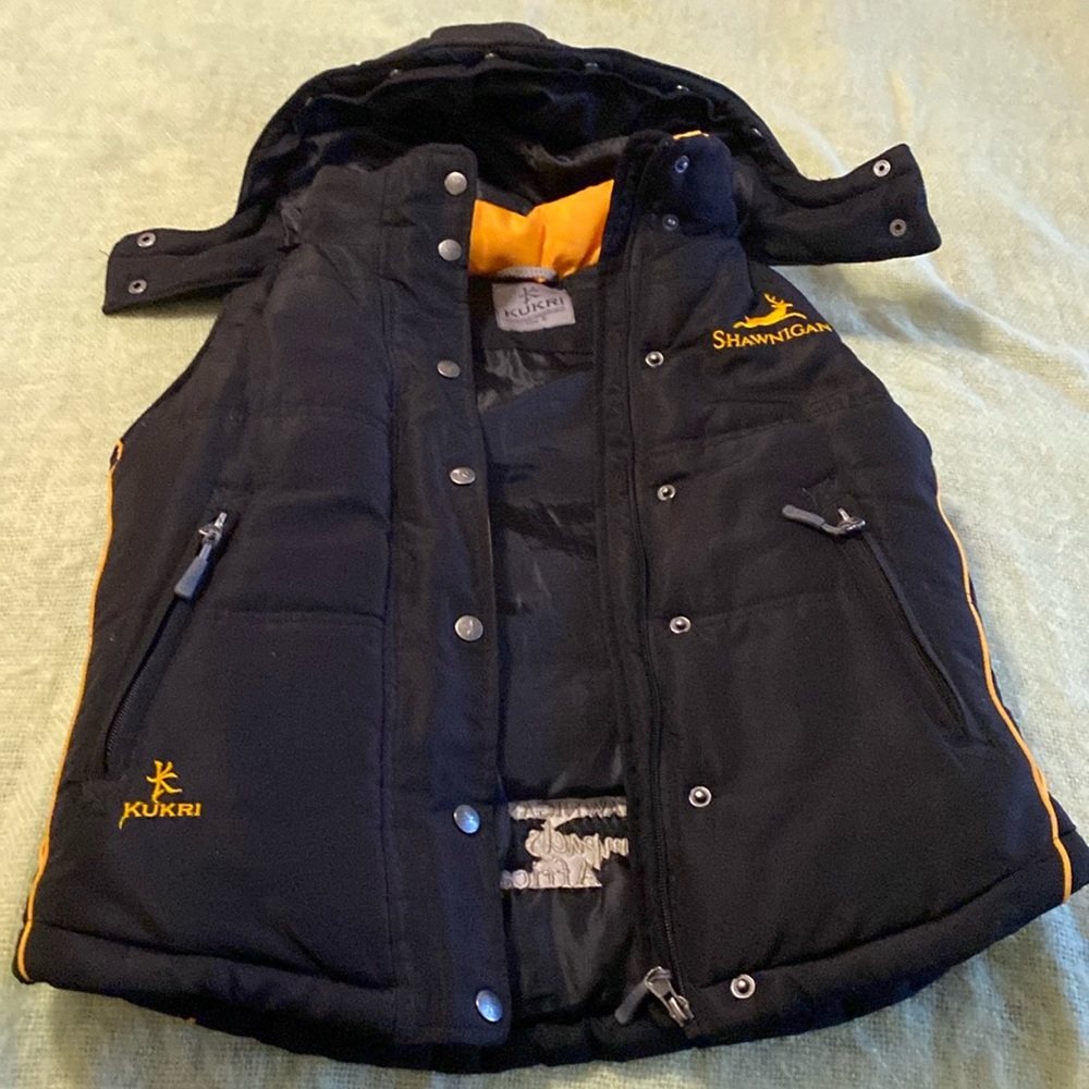 Vest like new condition, unisex size Small.